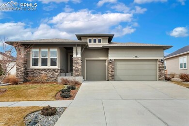 driveway, stone siding, and stucco siding