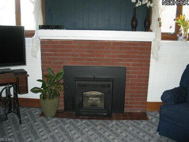 Living Room Fireplace w/Pellet Stove insert. This 