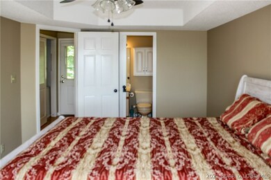 main level bedroom view from sliding door into jac