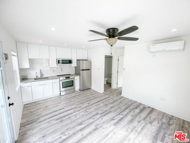 4556 Saint Charles Place, Los Angeles, CA 90019 - photo 4