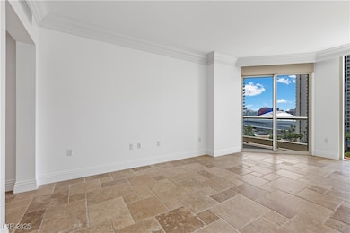 Unfurnished room with stone tile floors, ornamenta