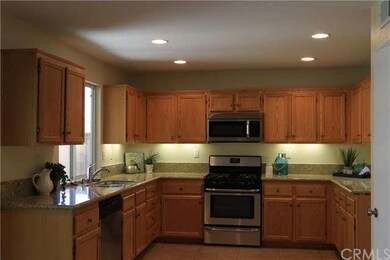 Kitchen with granite counter tops, stainless steel