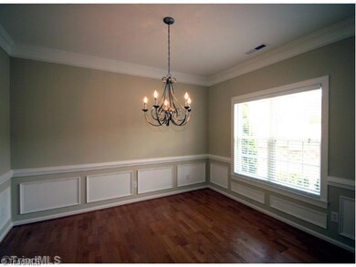 Dining Room. Formal dining room in front of home, very nice added feature in a golf villa.