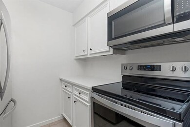 Another view of the remodeled kitchen! There is plenty of storage space.