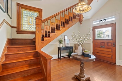This intricate heart-of-pine staircase showcases t