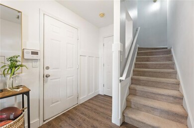 Stairway with wood finished floors