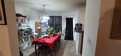 Dining area featuring a notable chandelier