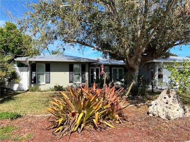 Single story home featuring a front lawn and frenc