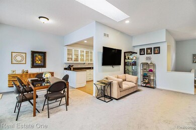 Dining room featuring a skylight, and recessed lighting