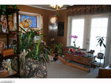Dining Room - Being used for piano and plants.  Fr