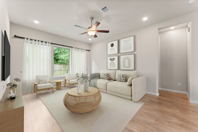 **Virtually Staged** Relax in the spacious and bri