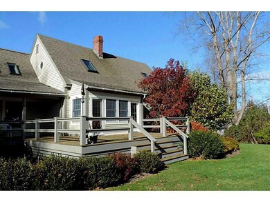 Exterior Front. Decks on east and...