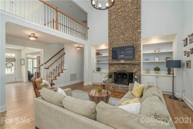 2 story stack stone fireplace
