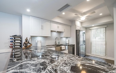 1814 Presidential Way unit 103, West Palm Beach, FL 33401 - photo 3