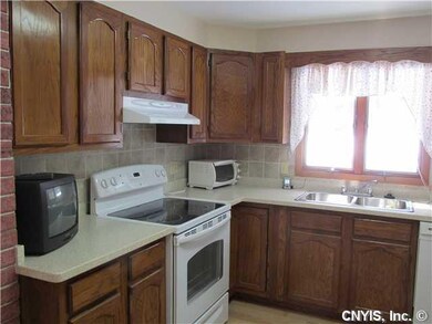 Kitchen. IMPRESSIVELY UPDATED KITCHEN WITH CORIAN 