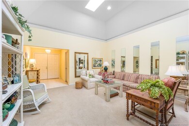 Great room looking back to the double entry doors.