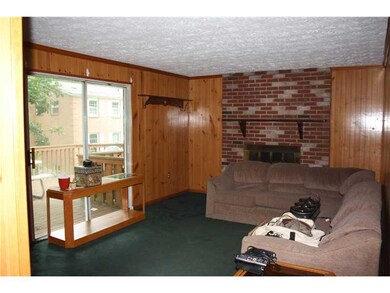 Family Room. Fireplace, slider to deck
