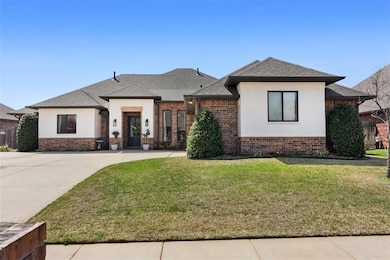 View of front of home with a shingled roof, a fron