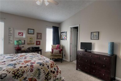 Another view of this cozy & stylish bedroom