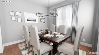 Dining area with a chandelier and wood finished f