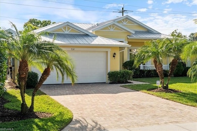 View of front facade with a garage and a front yar