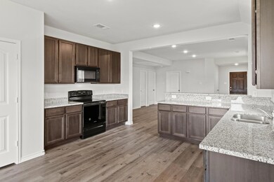 1607 Luke St, Ennis, TX 75119 - photo 6