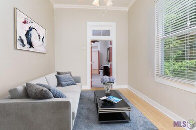 Roomy front room. Lots of windows, good natural li