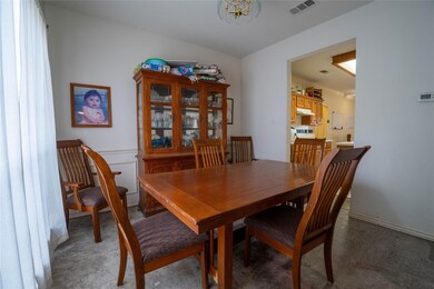 Dining space with a chandelier
