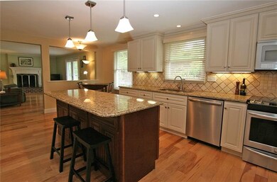 Beautifully remodeled kitchen opens to the family 