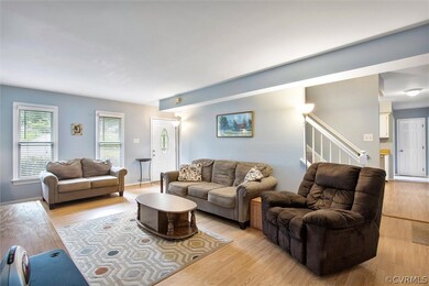 Great flow with a rear staircase and easy access to the screened porch and kitchen.