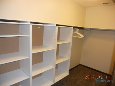 inside the walk in closet  for master bedroom