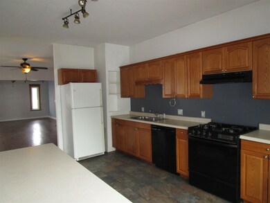 Spacious Counter Tops, Custom Cabinetry w/Pull Out