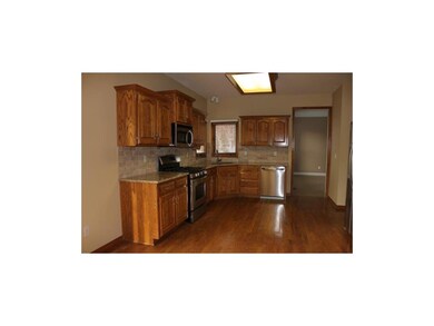 Large kitchen has tons of cabinets, new composite 
