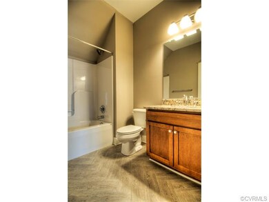 All of the baths feature designer tiled floors, wa