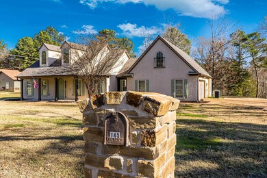 View of front of property featuring a porch and a 