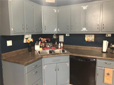 Kitchen cabinets have been recently painted and pr