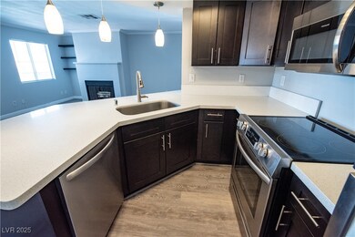 Kitchen with stainless steel appliances.