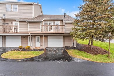 ATTACHED GARAGE AND PAVED PARKING AREAS ALLOW PLEN