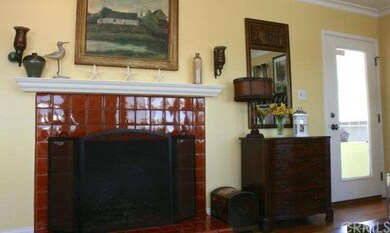 Charming fireplace in the living room adds warmth 