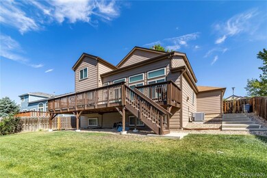 Backyard with deck in view - new concrete stairs b