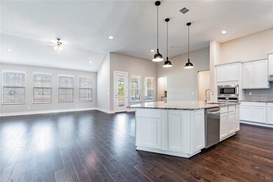 Home under construction. Photos of completed home of same floor plan.