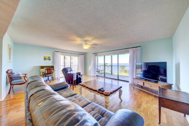 living room with sliders to balcony - Co
