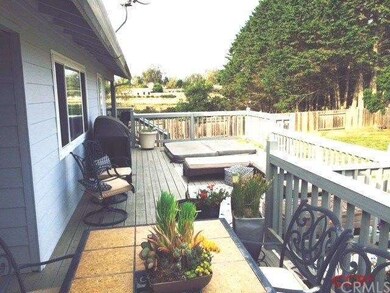 Large backyard deck with built-in spa
