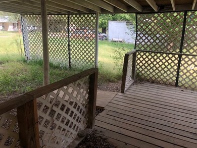Covered deck and carport.