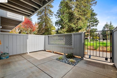 Gate featuring a patio area