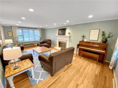The living room also features a bow window and gas
