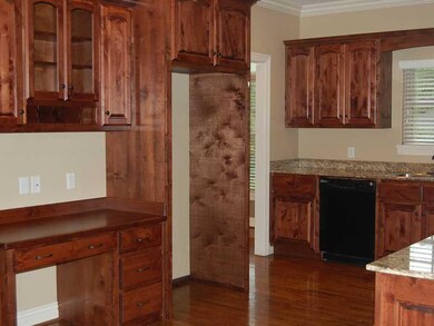 Kitchen. built in office space in cabinetry