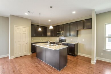 View of the Kitchen area of the Ridgemont with bar