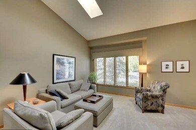 The vaulted living room has 2 skylights for added 