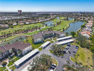 Bird's eye view with golf course view, a water vie